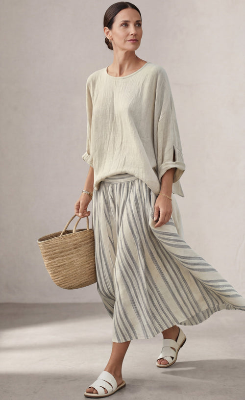Aurora — Blusa cómoda y falda midi a rayas